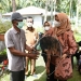 Ketua TP PKK Kepri Serahkan Bantuan Bubu dan Jaring Ikan di Bintan