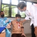 Tinjau Pelaksaan Vaksinasi Anak Usia 6-11 Tahun, Jokowi Harap Anak Terlindungi Covid-19