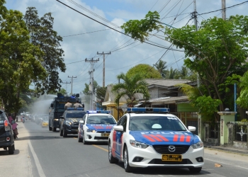 Penyemprotan Gunakan Kendaraan Water Canon Polres Natuna
