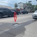 Lubang di Simpang Jalan Gatot Subroto Bahayakan Pengguna Jalan